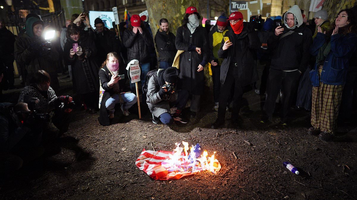 American flag set alight and stamped on outside Downing Street as lefty protesters including Jeremy Corbyn rail against Trump's Venezuelan intervention chanted 'death to the USA'
