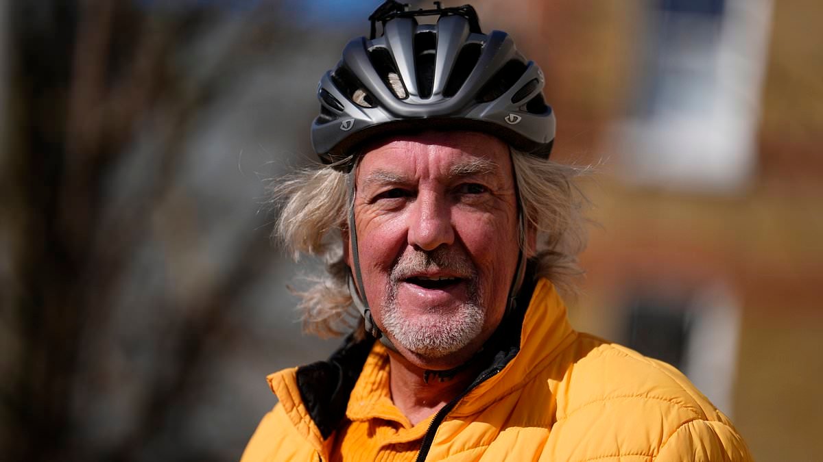 James May arrives at court on his bicycle after being charged with failing to insure his classic car