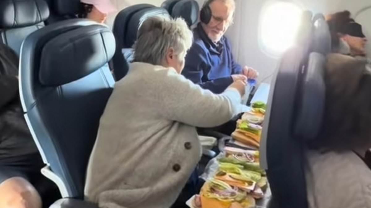 Shock as female plane passenger opens makeshift DELI in economy class to construct elaborate sandwiches for her family