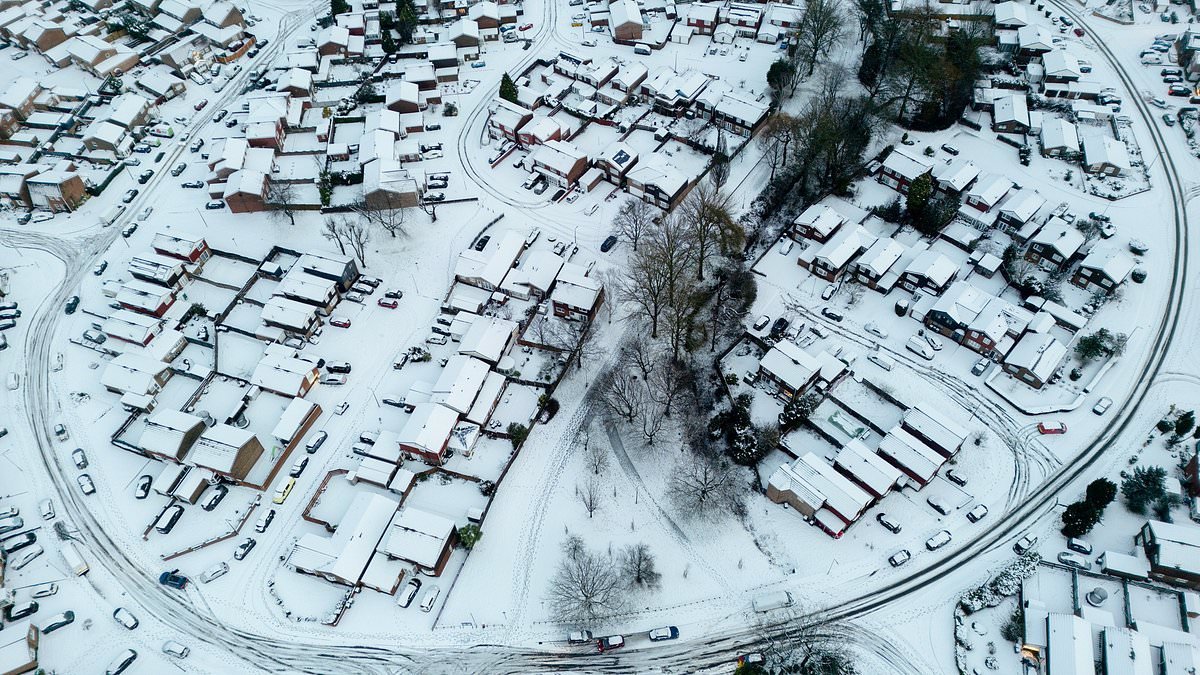 Britain could be hit with a foot of snow tomorrow as Met Office issues amber warning amid fears of flooding - as country counts the cost from deadly Storm Goretti