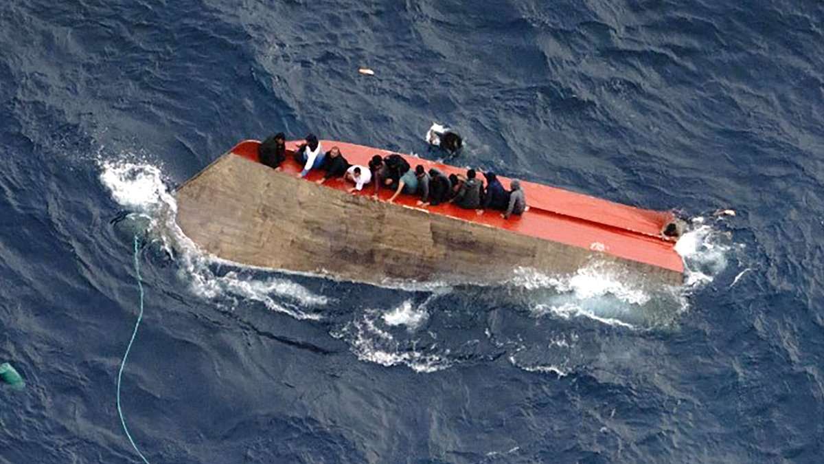 More than 70 migrants feared dead after crammed small boat capsizes off the coast of Libya
