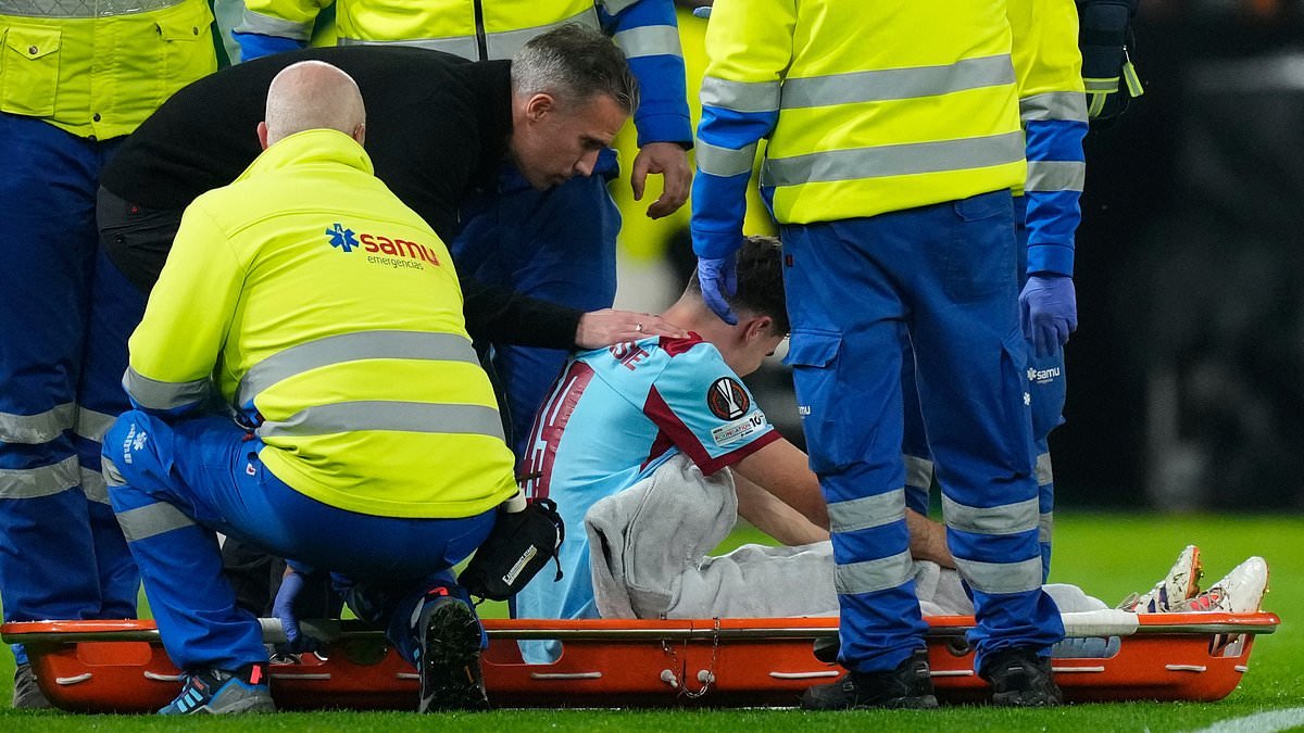 Man United legend comforts his son, 19, in 'heartbreaking' scenes after he suffered a major knee injury just days after scoring his first senior goal