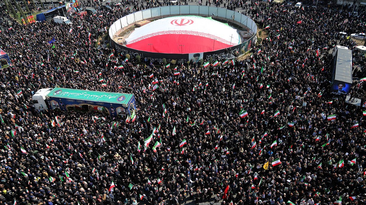 Thousands attend funeral of Iran's 'stand-in' leader Ali Larijani and his son as their bodies are paraded on trucks adorned with images of the dead