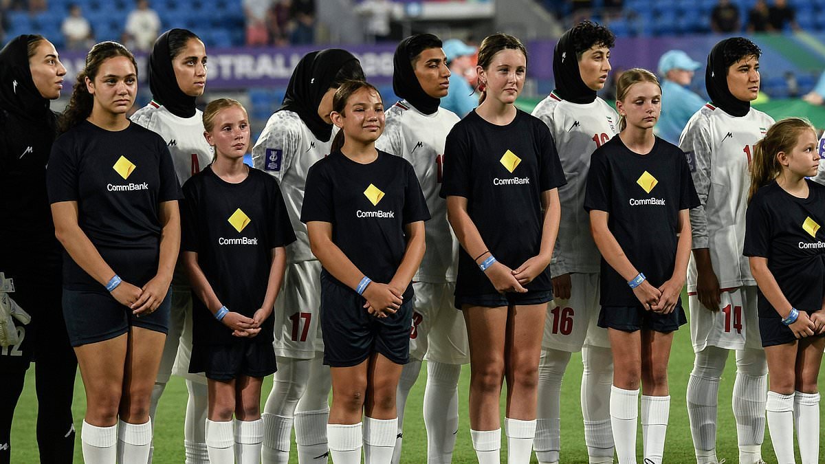 The Iranian football team REFUSE to sing their national anthem at the Asian Cup as war rages in their homeland