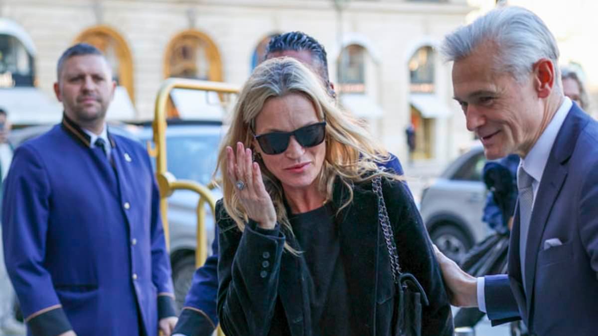 Kate Moss' model daughter Lila, 23, is her mirror image as the lookalike duo arrive in Paris alongside a radiant Bella Hadid ahead of Fashion Week