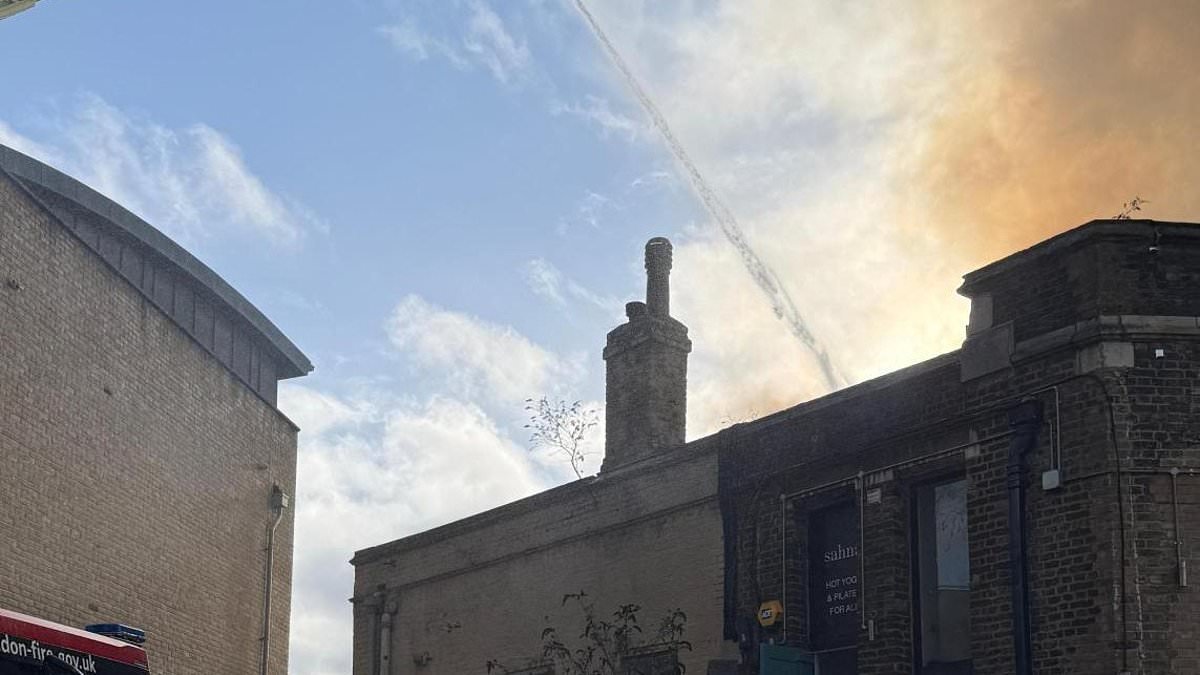 Travel chaos as massive blaze erupts near London Euston station with 70 firefighters tackling the flames and thousands of passengers hit by delays