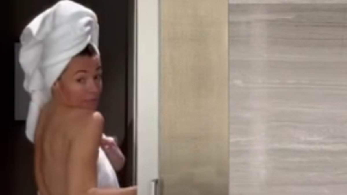 Cat Deeley cheekily dances in a towel as she shares hotel 'get ready with me' clip during winter getaway
