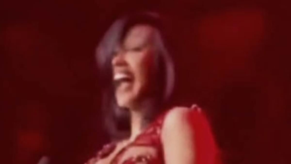 Cardi B suffers huge blunder as she falls off her chair during Las Vegas show before taking another playful jibe at the government