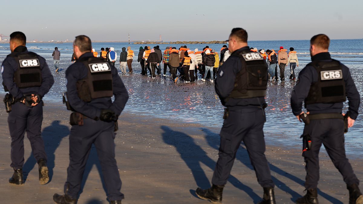 Pas mon problème! French police stand idly by as migrants crowd onto dinghies for Channel crossing - week after UK handed over £16.5m to cover patrols