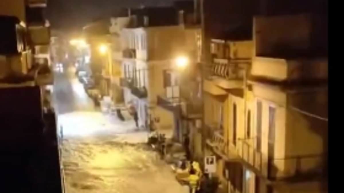 Moment people run for their lives from tsunami-style storm surge which engulfs Italian street in seconds as storms wreak havoc across Europe