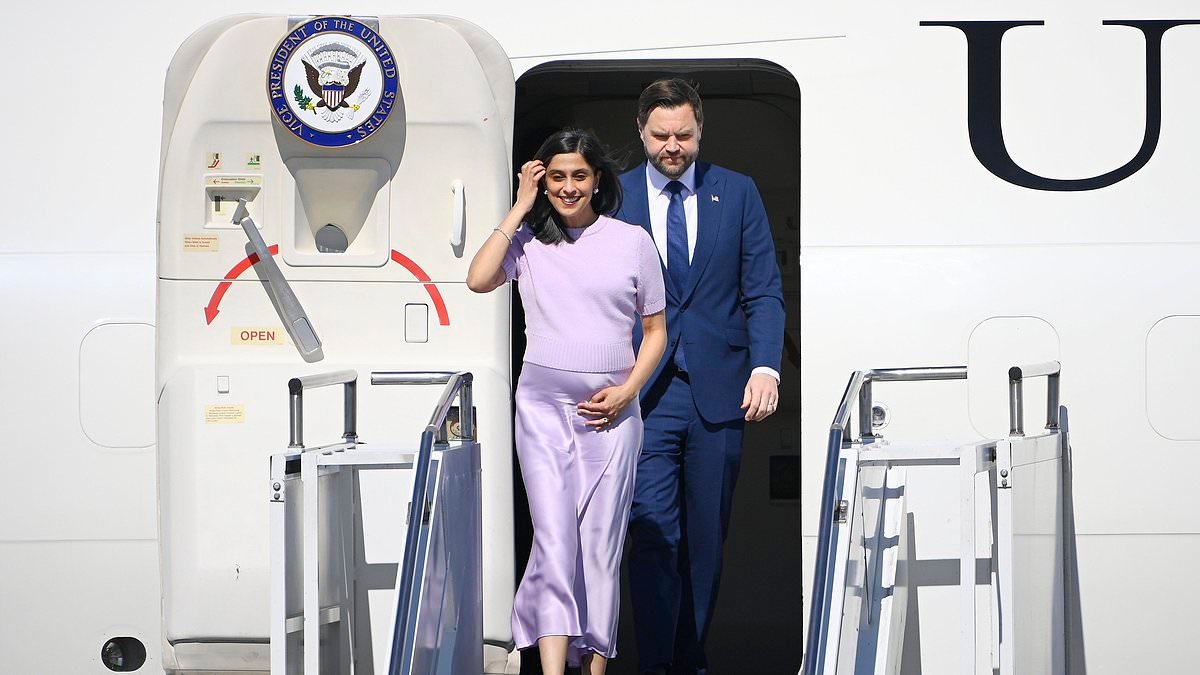 Usha Vance cradles her growing baby bump in chic lilac ensemble as she joins husband JD in Hungary
