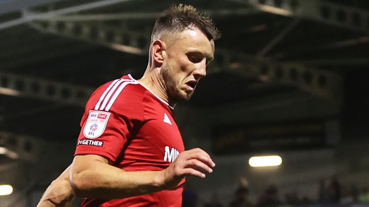 Footballer's 'violating' act that left opponent struggling to speak: Swindon star gets SEVEN-MATCH ban for act on rival's 'private body parts in extremely serious and unusual incident'