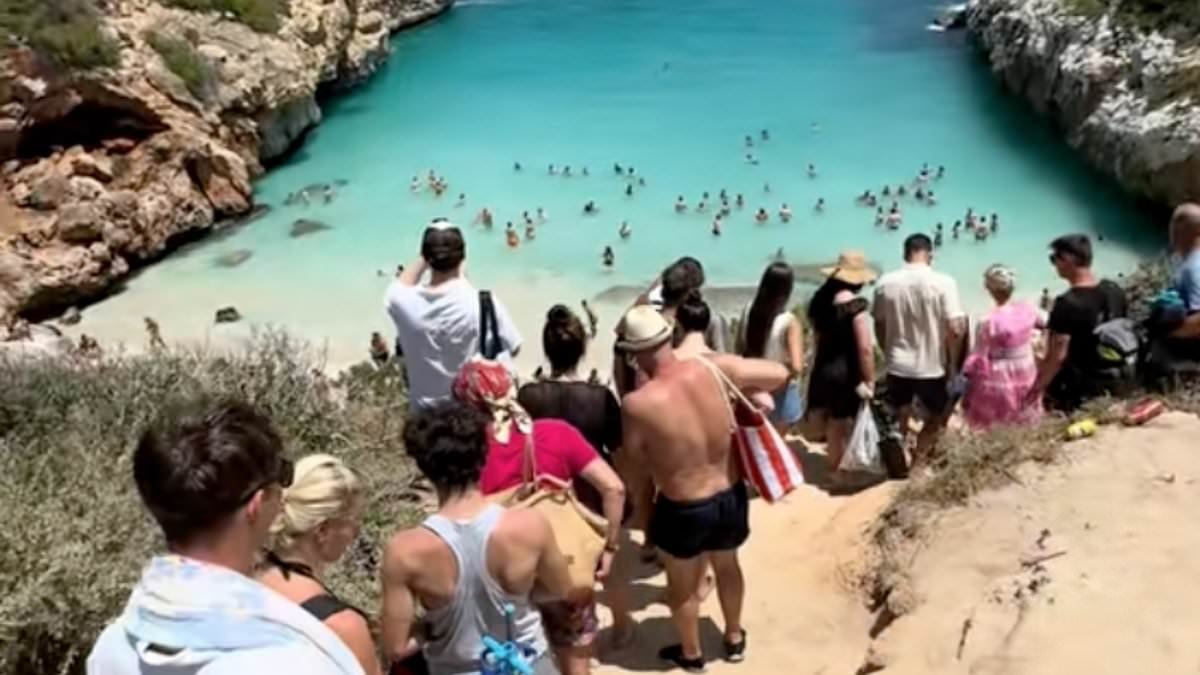 Overrun Spanish island 'Instagram' beach will be sealed off by German millionaire owner because they're fed-up having 4,000 selfie-hunters swarm the tiny patch of sand daily