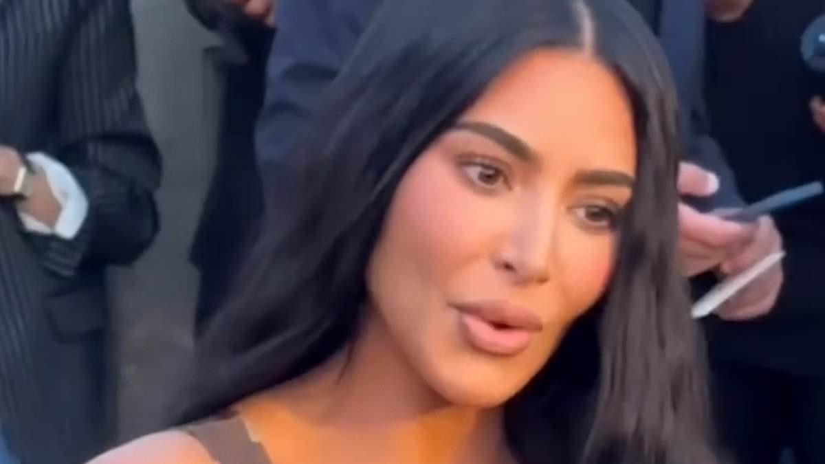Kim Kardashian and Lewis Hamilton share hint at their close bond as footage shows the pair chatting at Louis Vuitton's Paris show - three years before their 'secret romance'