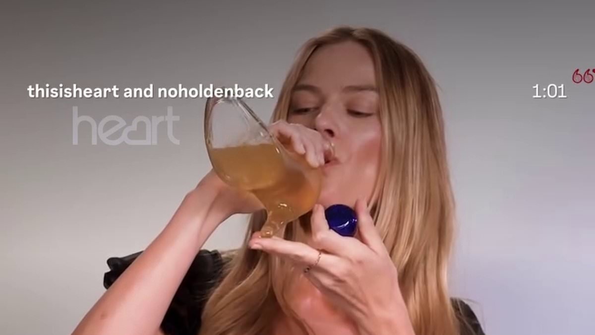 Margot Robbie brands Amanda Holden a 'legend' as they neck beer and gin while doing a 'shoey' during morning interview