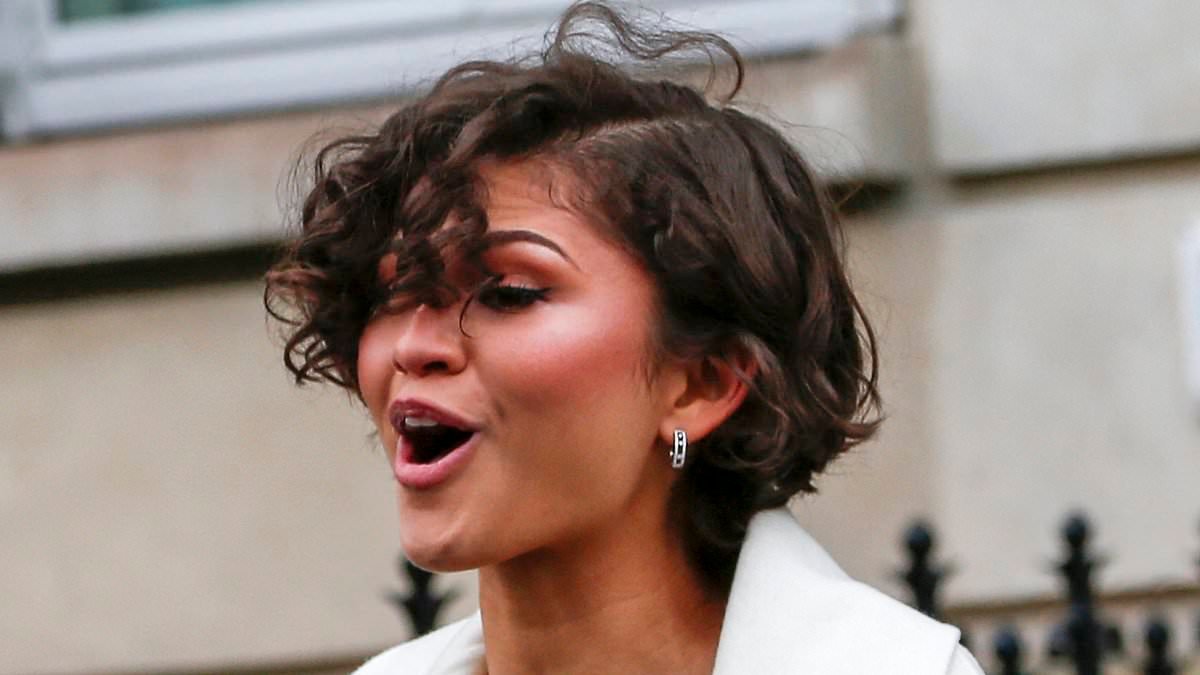 Zendaya continues bride 'method dressing' as she steps out in Paris wearing a stunning white outfit and flashes her ring finger amid marriage guessing game
