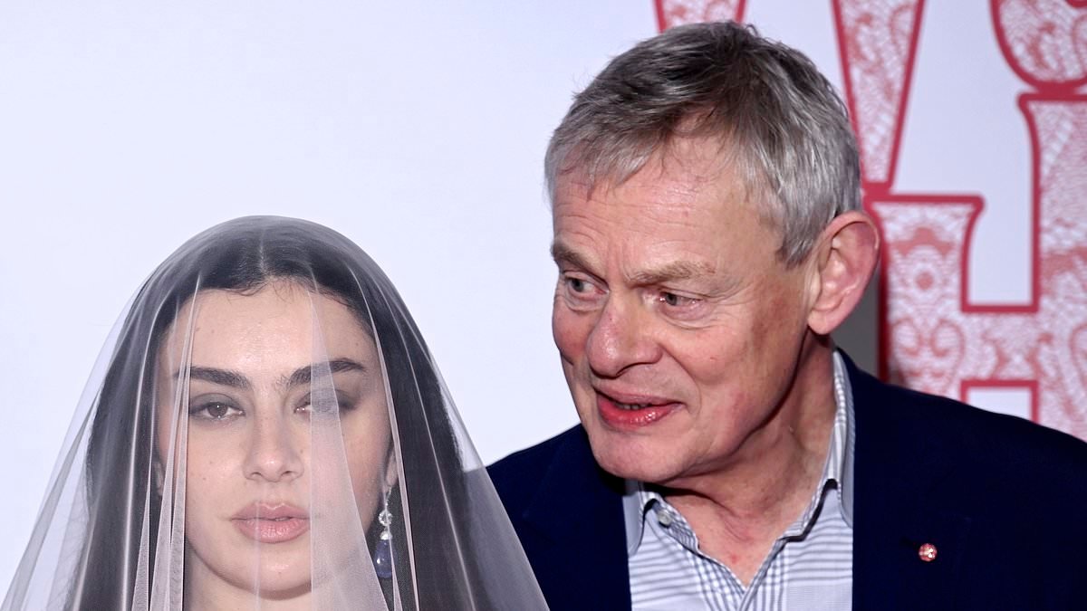 Martin Clunes looks delighted to be surrounded by A-listers Margot Robbie and Charli XCX at London premiere of his new movie Wuthering Heights
