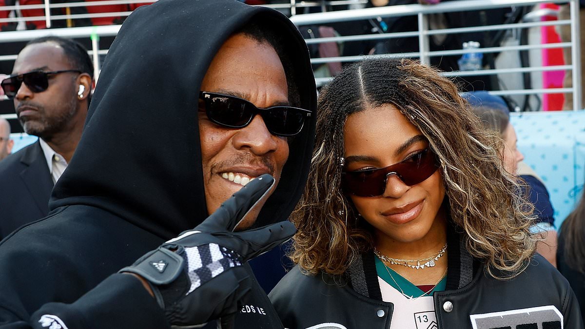 Beyonce's daughter Blue Ivy, 14, looks just like her famous mom as she joins dad Jay-Z and rarely-seen sister Rumi, 8, at Super Bowl LX