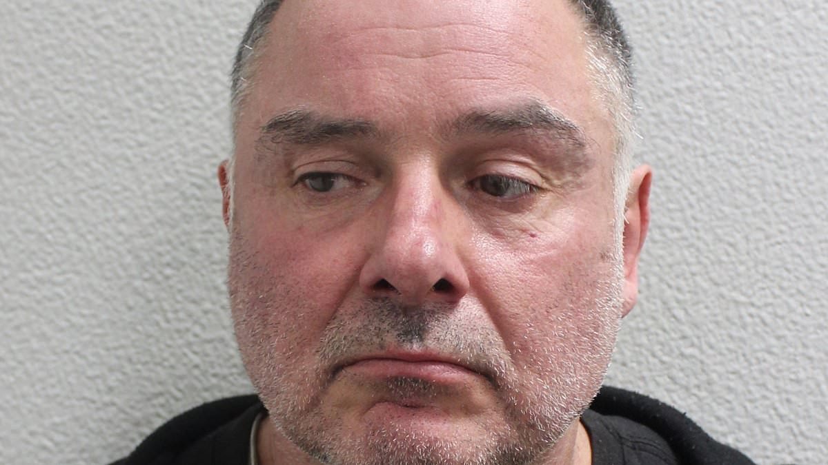 Lorry driver who ran gun-conversion and explosives workshop from a caravan while preparing for 'race war' is jailed for 16 years
