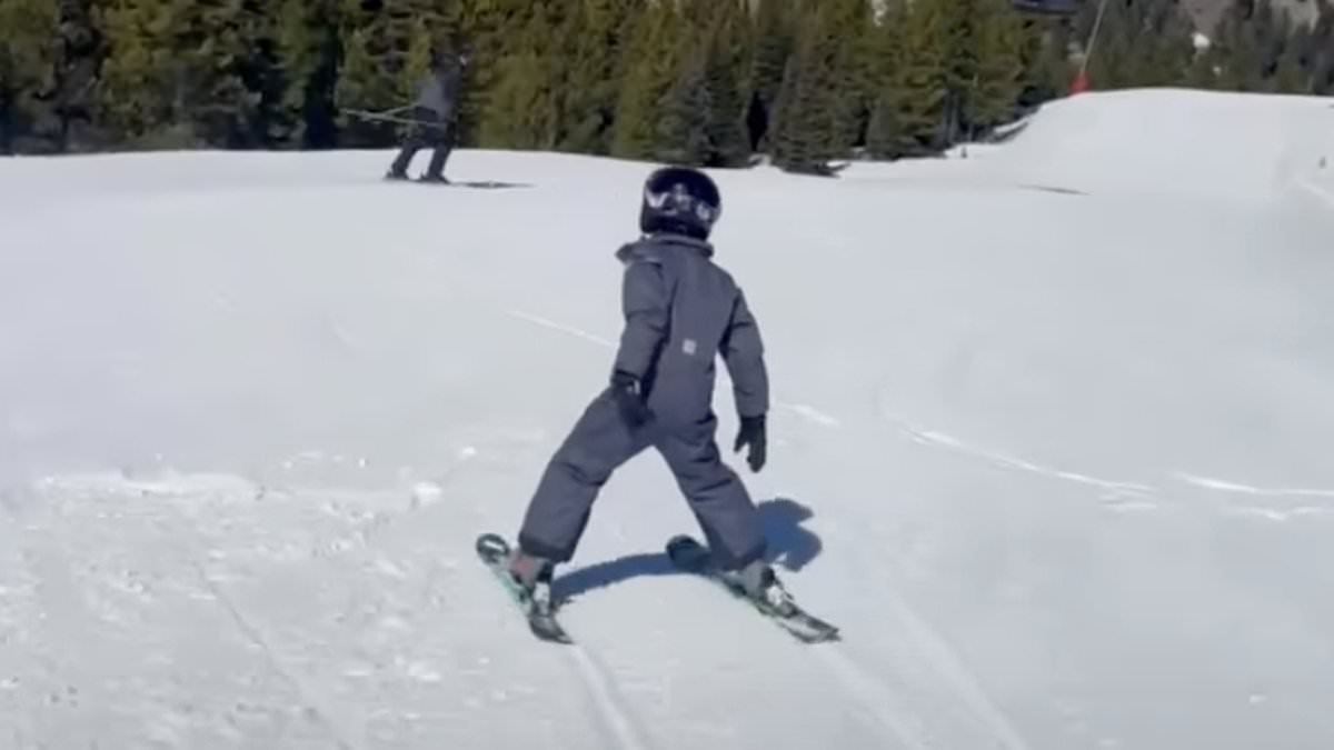 Meghan shares rare video of Harry and Archie skiing as Duchess gushes she's 'so proud'