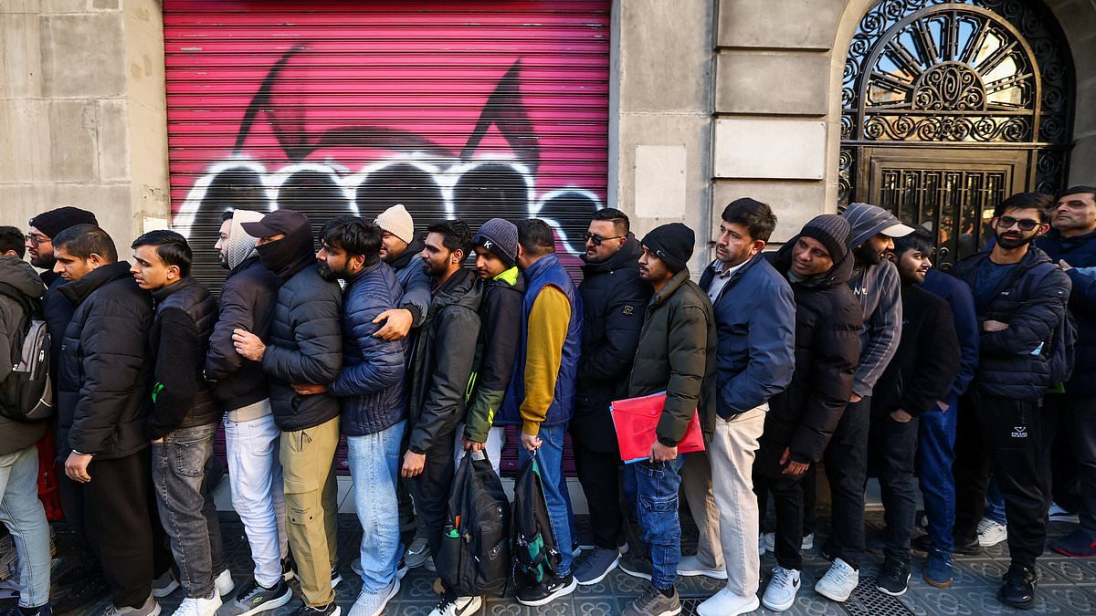 Huge numbers of migrants queue along the street to collect paperwork after socialist Spain announced it would grant legal status to 500,000 - sparking row between PM and Elon Musk over rigging elections
