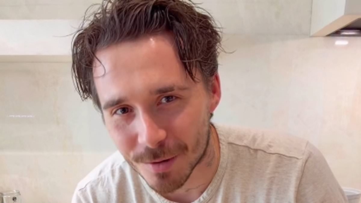 Brooklyn Beckham brushes off unfollowing the Ramsays after Gordon waded into family feud as he makes another nod of devotion to wife Nicola Peltz with Janet Jackson's 'All For You' song in latest cookery video