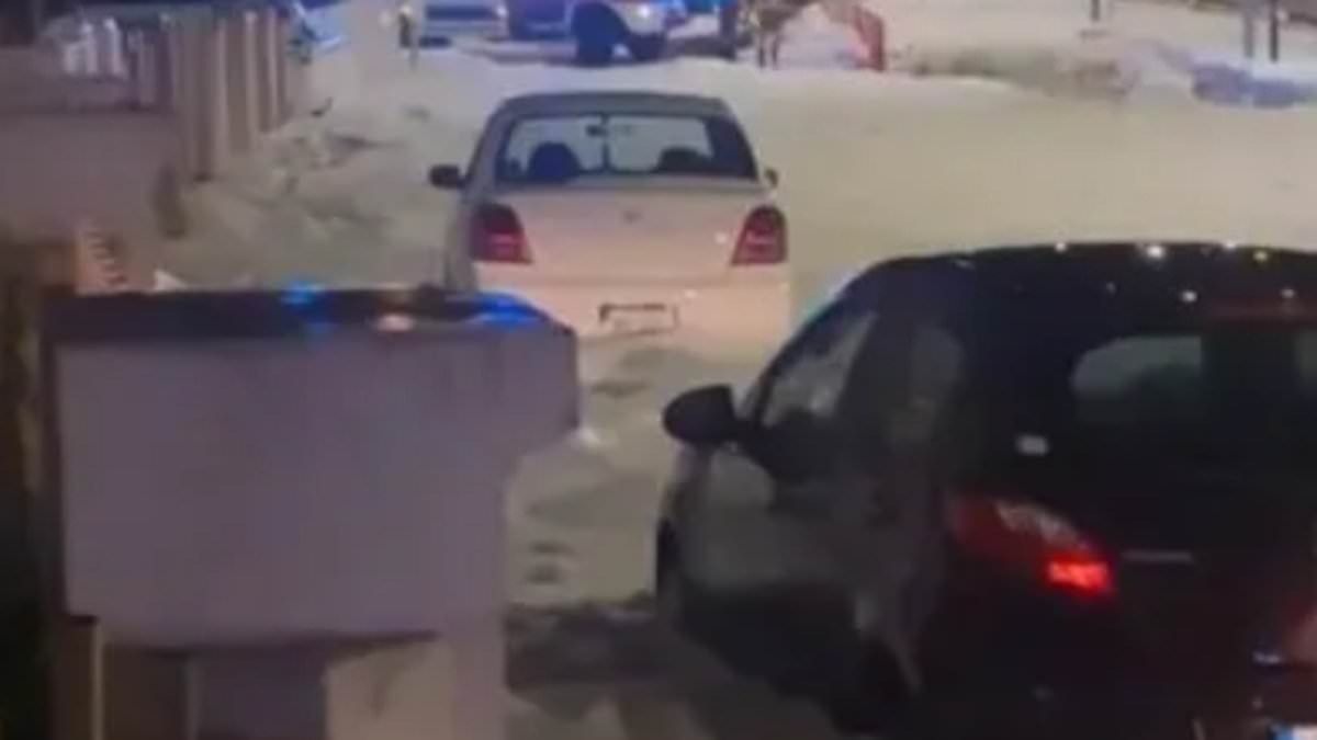 Icy floods swamp the streets of Mediterranean holiday island Malta, with cars buried under hailstones in freak storm