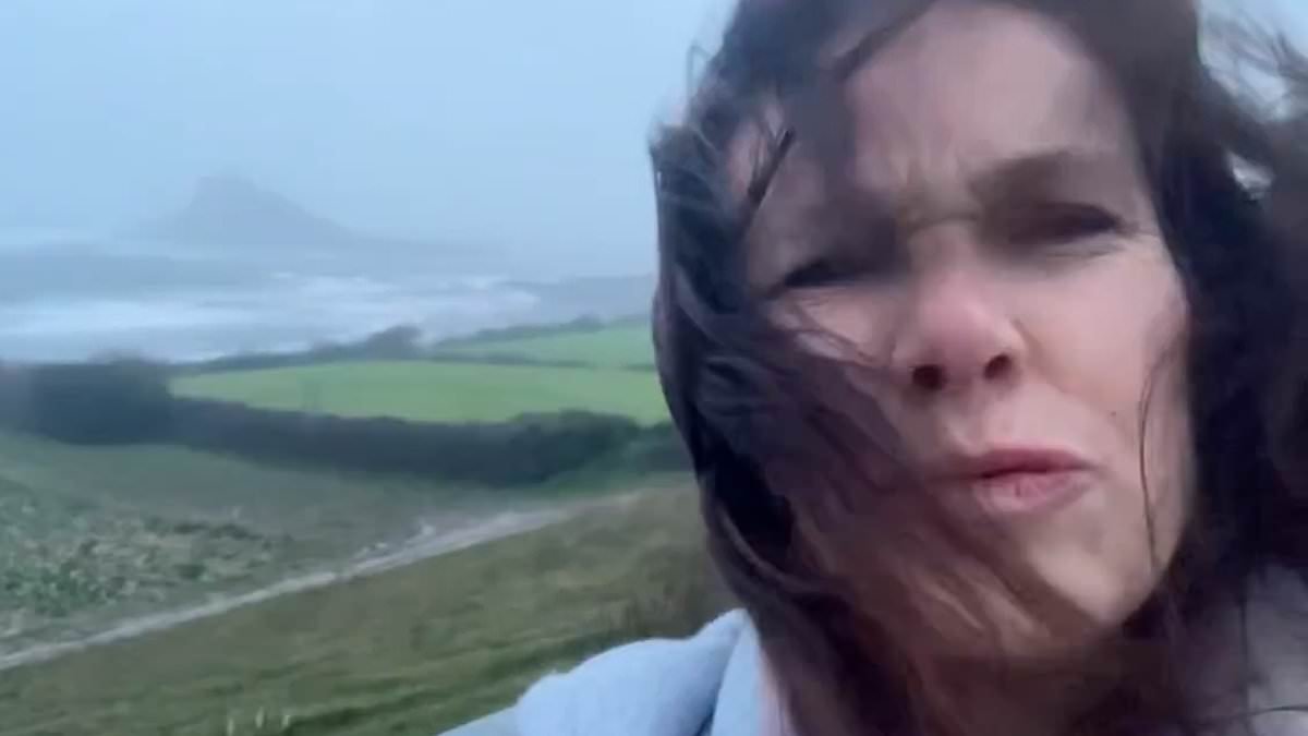 Reporters are bashed by winds and rain as they try to brave Storm Goretti