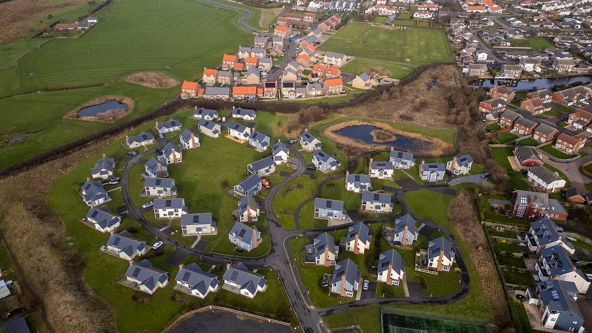 Revealed: Seaside village which banned new holiday homes is now split with two estates