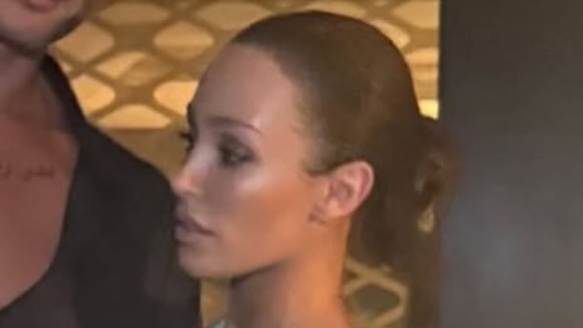 Bianca Censori models a skintight blue catsuit as she supports husband Kanye West's comeback concerts