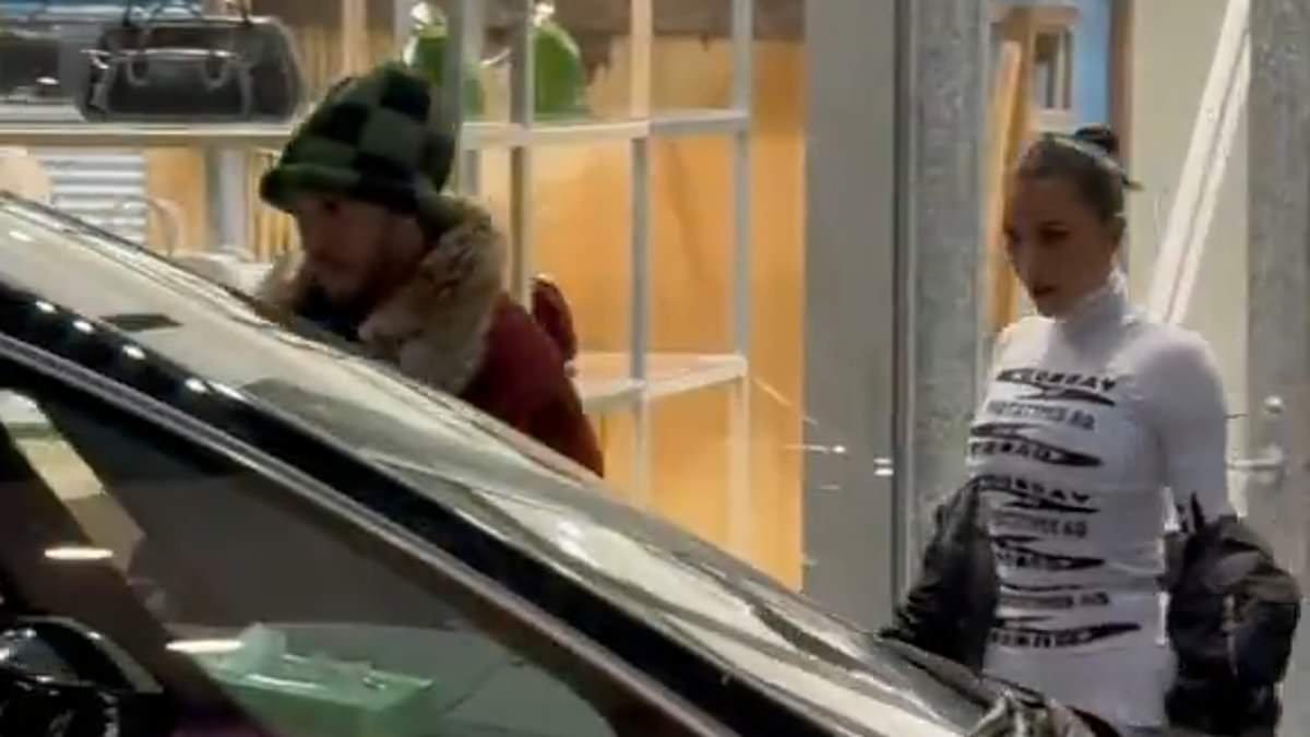 Kim Kardashian spotted on romantic Tokyo getaway with Lewis Hamilton amid blossoming relationship - as Formula One star reveals reason behind his Ferrari revival