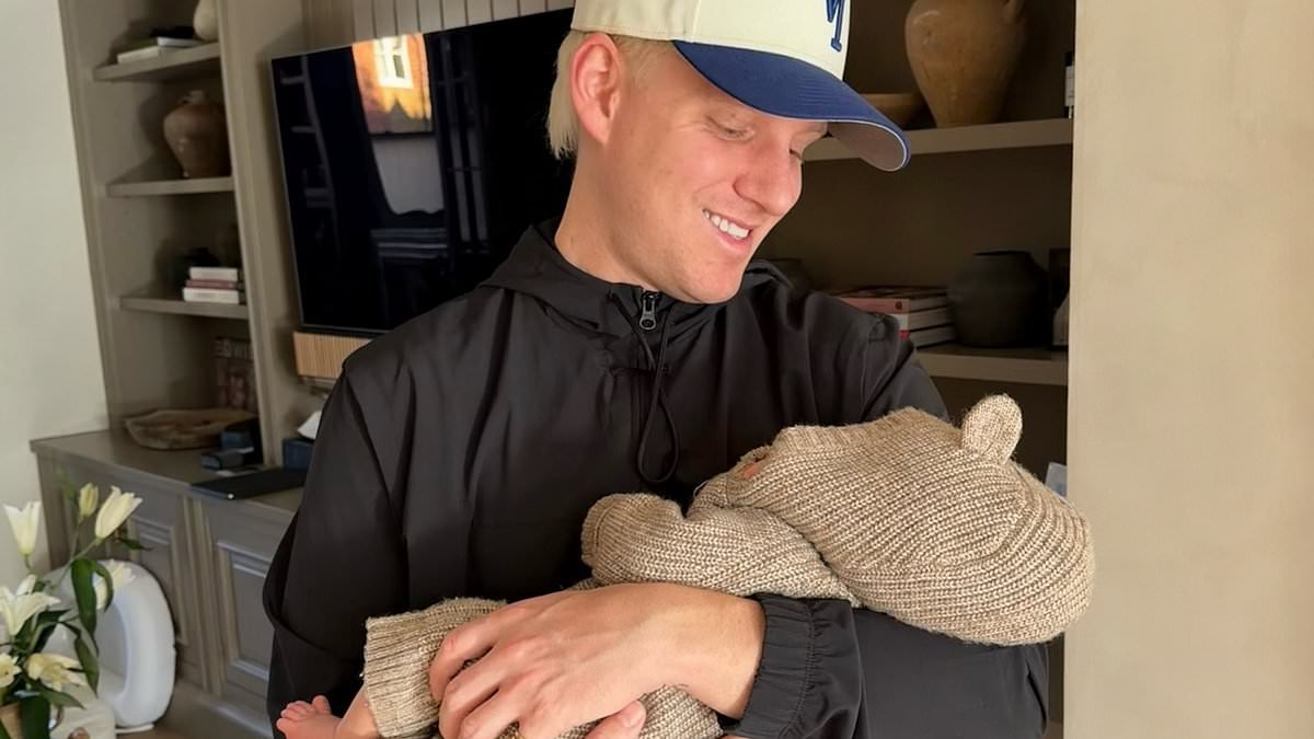 Jamie Laing is every inch the doting new father as he shares a sweet snap of baby son Ziggy - after he welcomed first child with wife Sophie Habboo