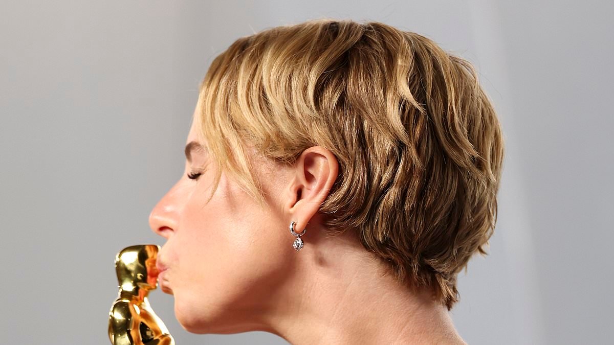 It's party time! Triumphant Oscar winners Jessie Buckley and Michael B Jordan kiss their awards as they celebrate at Vanity Fair party