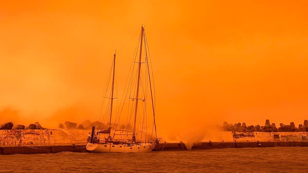 Greek island is cloaked by Saharan dust storm and hit by tornados with Easter holiday flights diverted and sky turning eerie red and orange