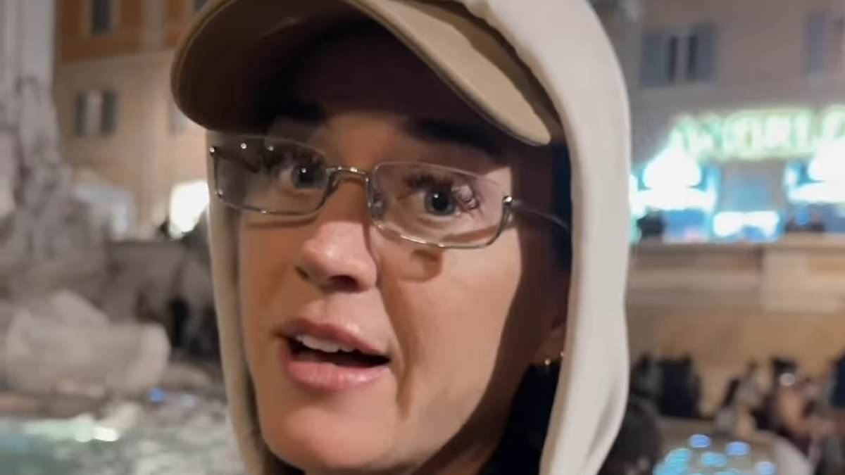 Katy Perry puts her credit card in Rome's Trevi Fountain for 'good luck' amid Ruby Rose controversy