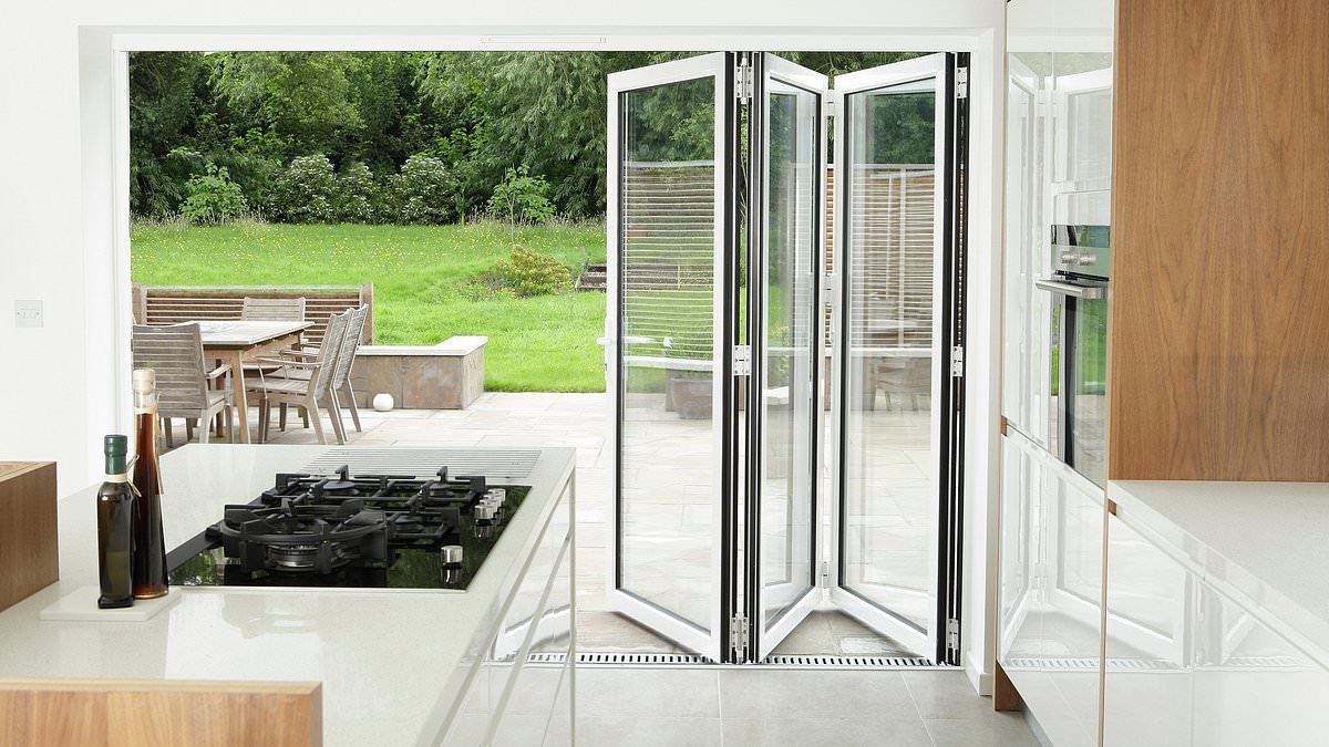 Sorry, but your bifold doors are dated and clunky! Interiors expert declares the staple of every middle-class kitchen officially over - and 7 timeless alternatives to replace them with