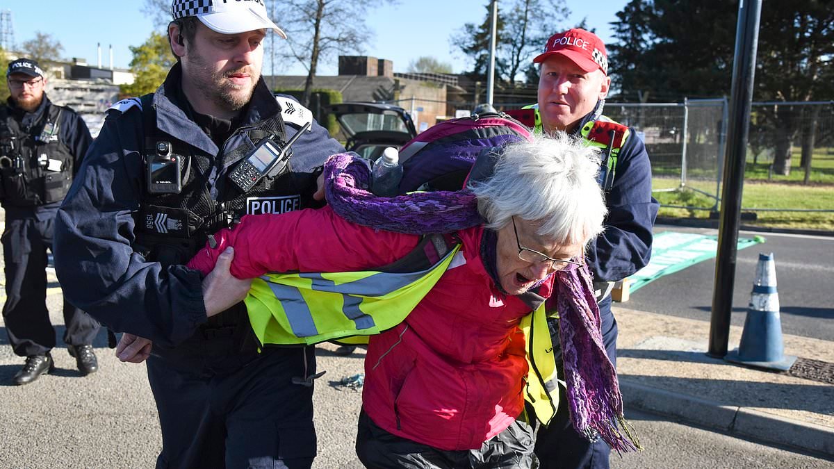 Thirteen people are arrested after peace protesters block RAF airbase gates in protest against Iran war
