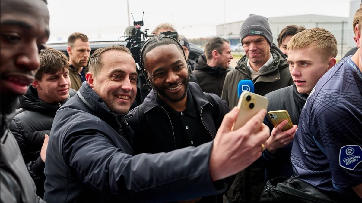 Raheem Sterling touches down in Holland: Former England star mobbed at airport after linking up with Premier League legend in surprise switch after Chelsea nightmare