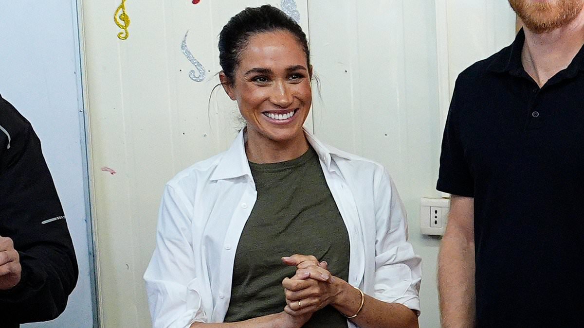 Down-to-earth Duchess! Meghan has no time to worry about creased trousers as she proudly focuses on her work in Jordan - with no entourage and no 6ft ironing board like Andrew's valet used to carry around