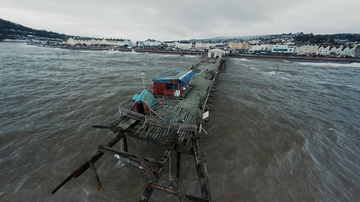 Going, going, gone! 150-year-old pier is destroyed by waves as Brits brace for MORE wild weather as yellow warnings are issued