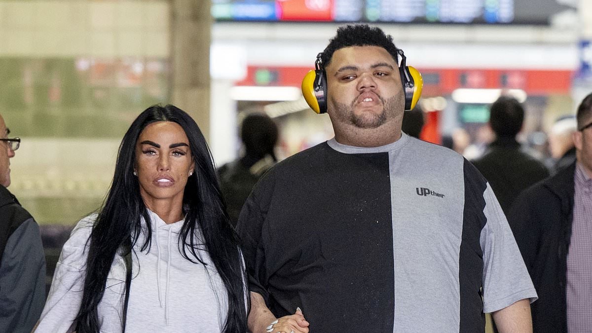 Katie Price holds hands with son Harvey as they leave train station amid claims her family's 'concerns over her relationship with Lee Andrews are putting a strain on their marriage'