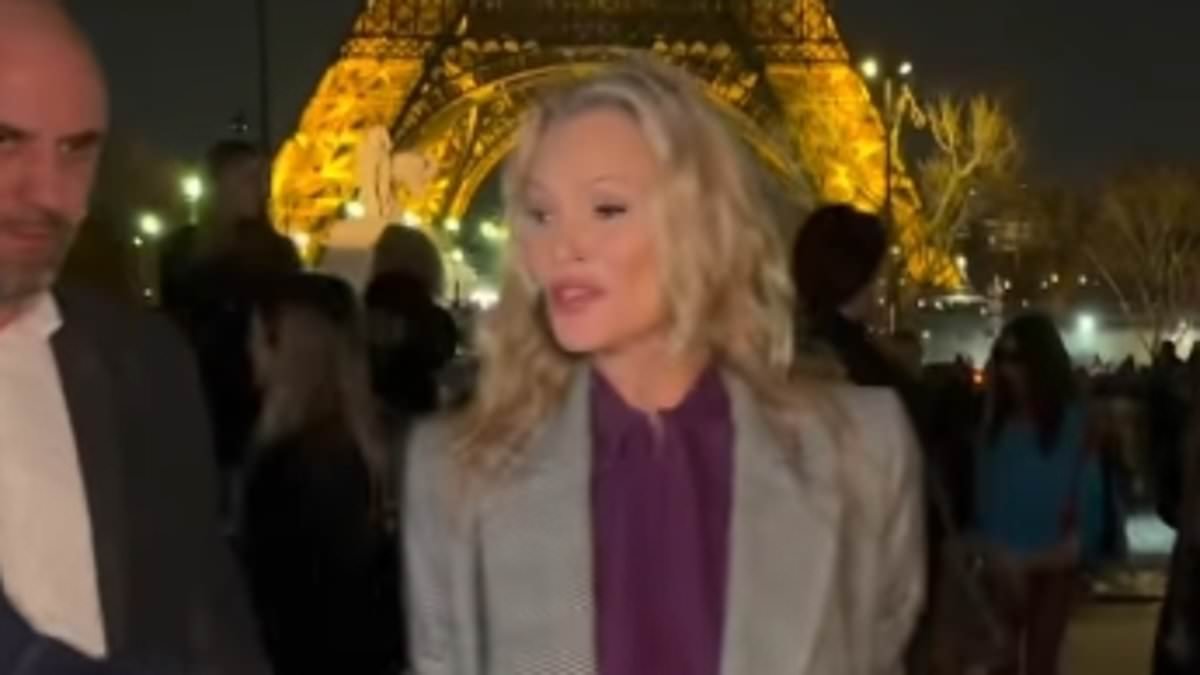 Kate Moss declares 'please don't touch me - I don't like being manhandled' as she reacts while arriving at the YSL show in Paris
