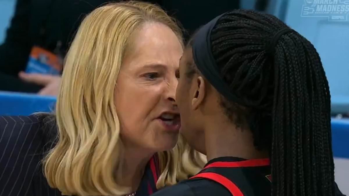 Maryland coach Brenda Frese screams in the face of star player Oluchi Okananwa in loss