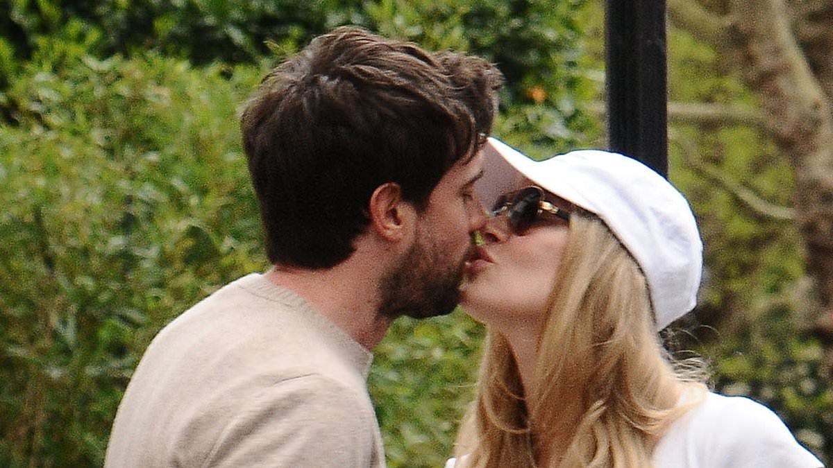 Bride-to-be Roxy Horner kisses Jack Whitehall as they say their final goodbye while her dress is carried out to a taxi ahead of their star-studded wedding this weekend